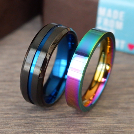 แหวนสแตนเลสไทเทเนี่ยมแท้ หน้ากว้าง 4 มิลลิเเมตร ผิวเงาโค้ง ไดร์ฟสีรุ้งไทเท