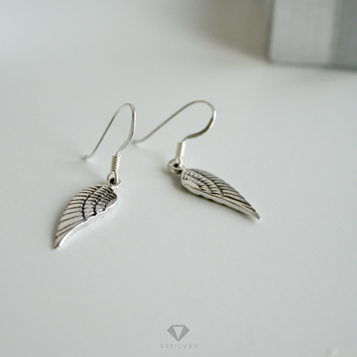 ต่างหูปีก Angle เงินแท้ทั้งชิ้น แกะลายปีกสวยงาม ขัดเงาลงดำ ต่างหูเป็นทรงห้อย