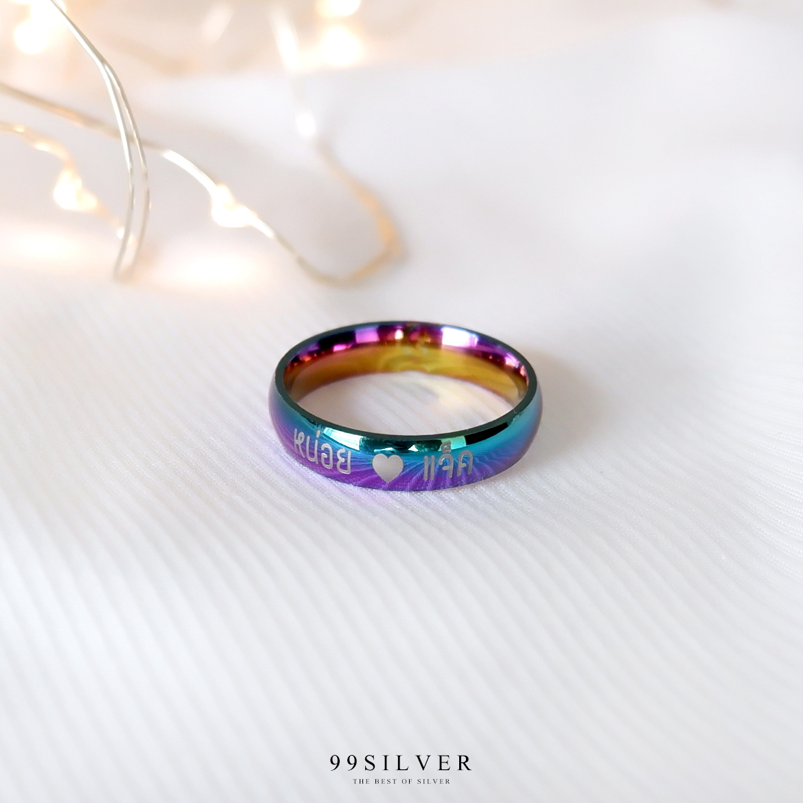 แหวนสแตนเลสไทเทเนี่ยมแท้ หน้ากว้าง 4 มิลลิเเมตร ผิวเงาโค้ง ไดร์ฟสีรุ้งไทเท