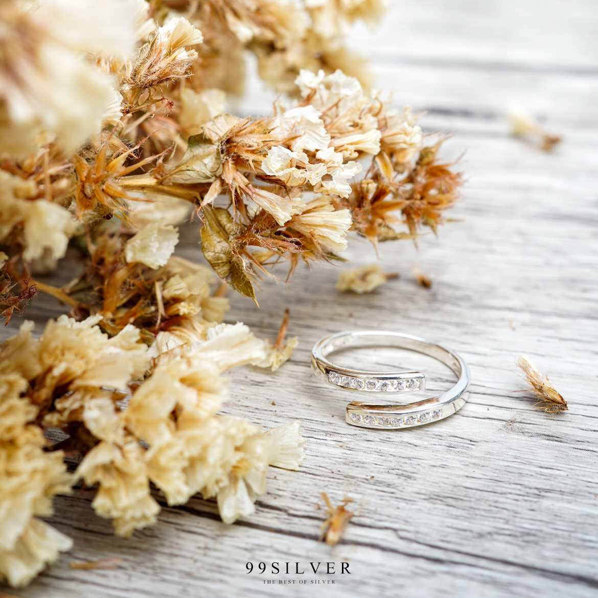 แหวนเพชรทรงไขว้ ตัวเรือนเงินแท้ฝังด้วย Cz Swiss สีขาว ดีไซร์สวยใส่ง่าย