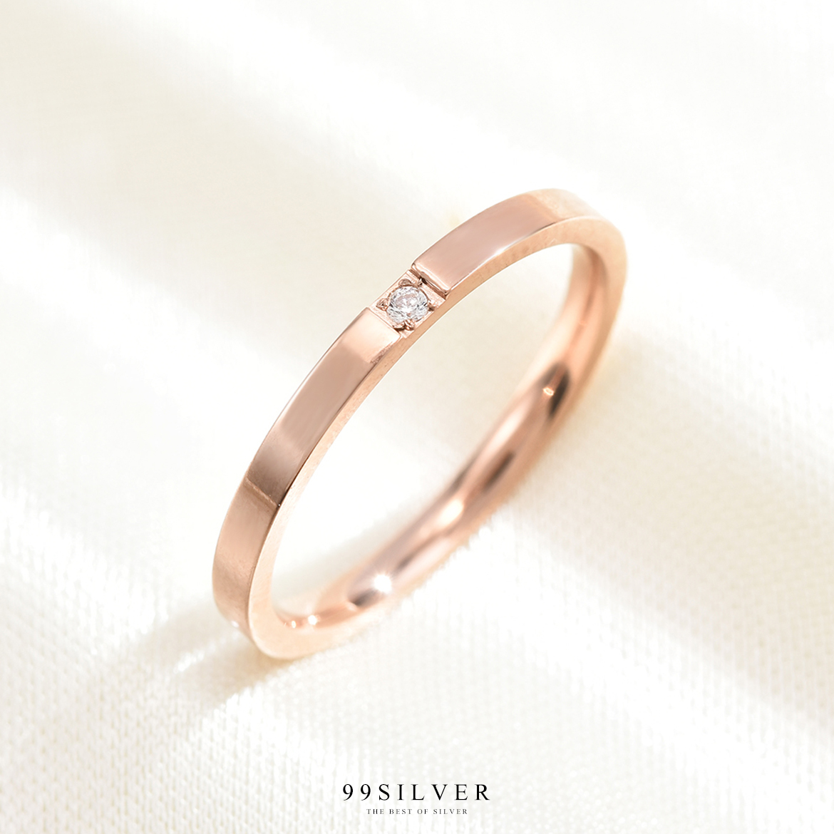 แหวนสแตนเลสฝังเพชร Cz Swiss แท้ 1 เม็๋ด ทรงหน้าเรียบ 2 มิลลิเมตร