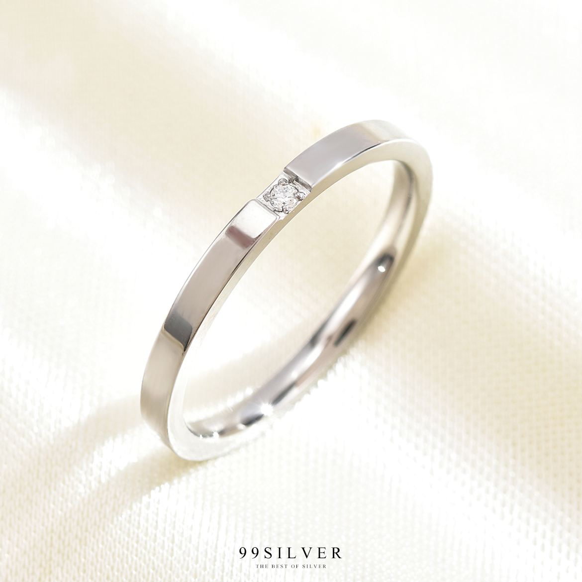 แหวนสแตนเลสฝังเพชร Cz Swiss แท้ 1 เม็๋ด ทรงหน้าเรียบ 2 มิลลิเมตร
