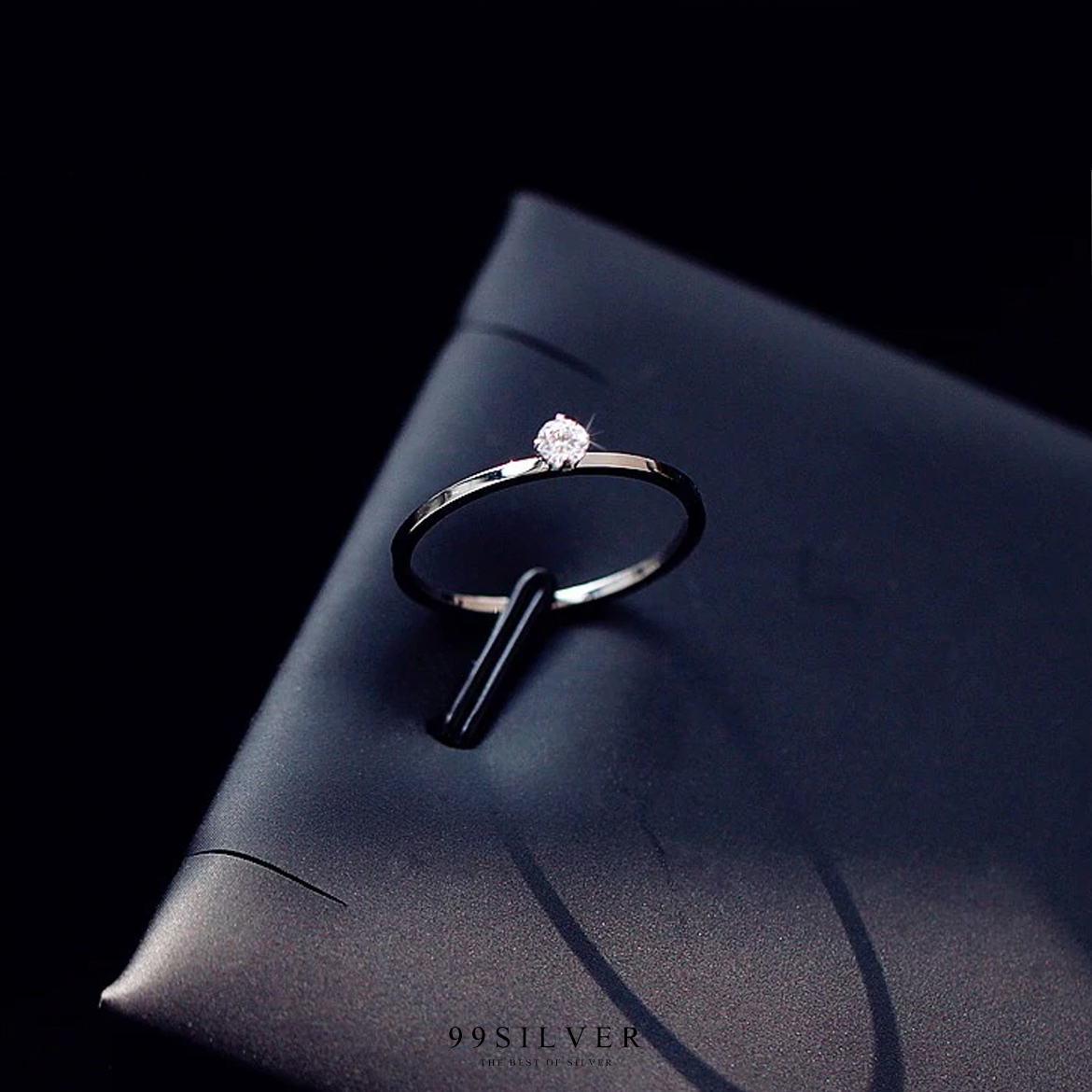 แหวนสแตนเลสแท้ชุบพิ้งโกลประดับเพชร Cz Swiss แท้ 1 เม็๋ด แบบชู ก้านจิ๋ว 1 มิลลิเมตร 