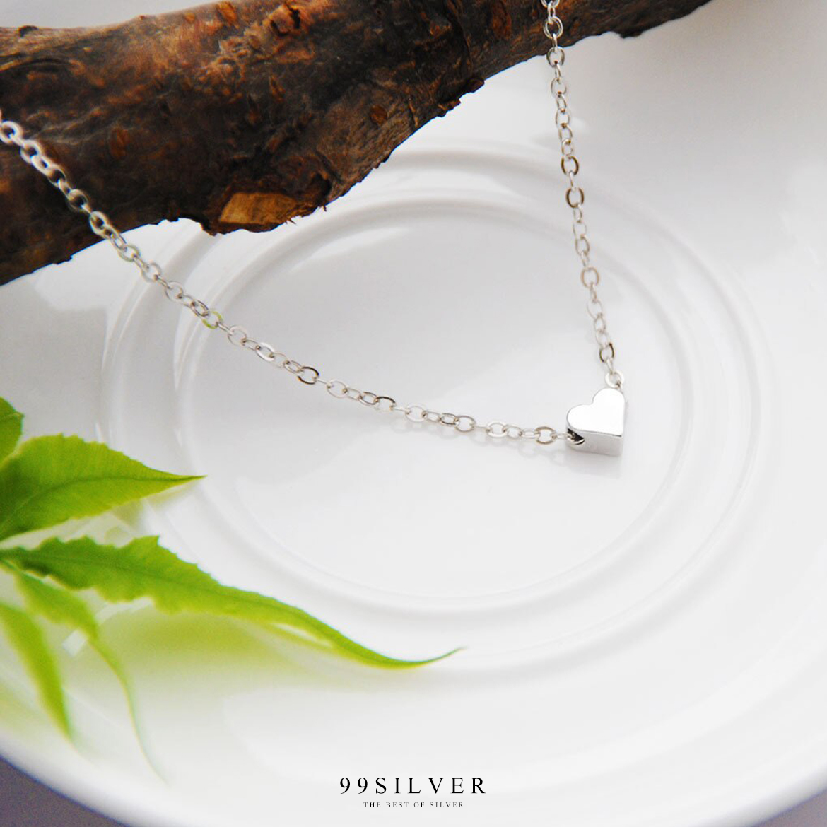สร้อยคอสแตนเลสพร้อมจี้หัวใจจิ๋ว จี้เป็นชาร์มร้อยสร้อยผ่านกลาง สามารถสลักอักษรได้
