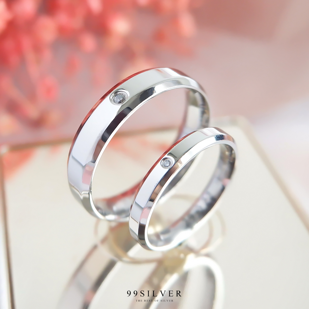 แหวนคู่รักสแตนเลส ตัวเรือนหน้ากว้าง 3 และ 5 มิลลิเมตร ฝังเพชร Cz Swiss วงละ 1 เม็ด