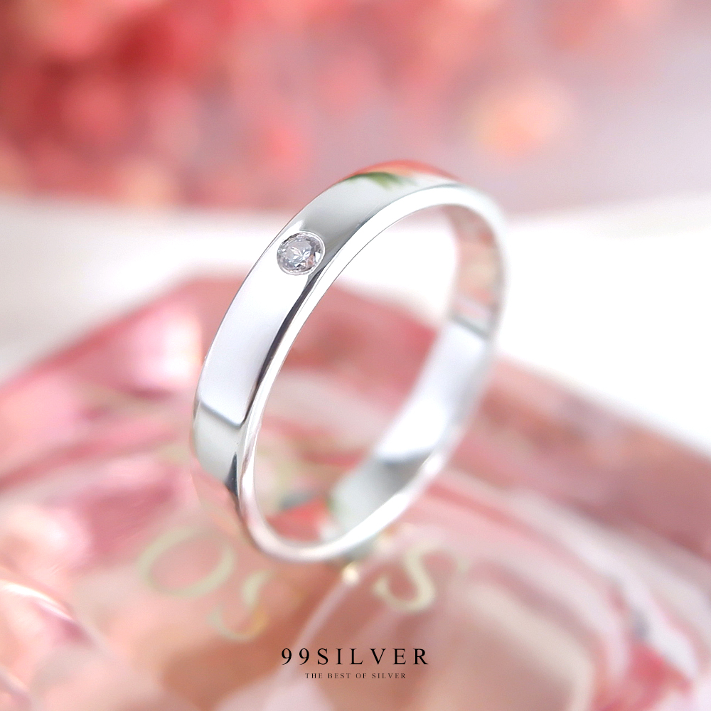 แหวนเงินแท้หน้าเรียบกว้าง 3 มิลลิเมตร ฝังเพชร 1 เม็ด ทรงกลม ตัวเรือนหน้าตัด