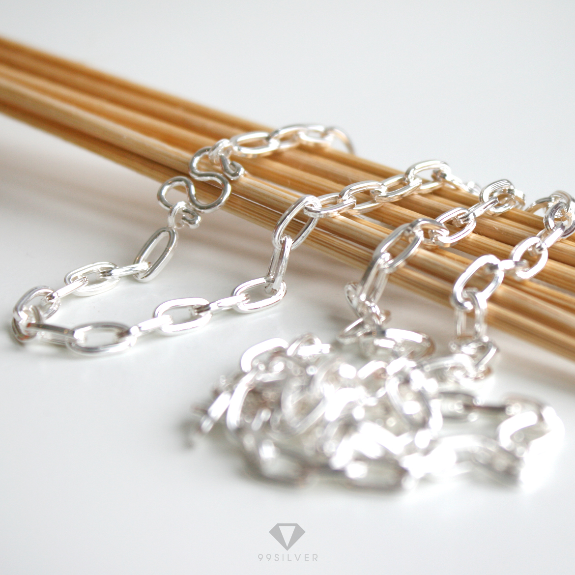 สร้อยโซ่ เงินแท้ทั้งเส้น ข้อกลางขนาดข้อยาว 7x4 มิลลิเมตร ผิวเงาแข็งแรง