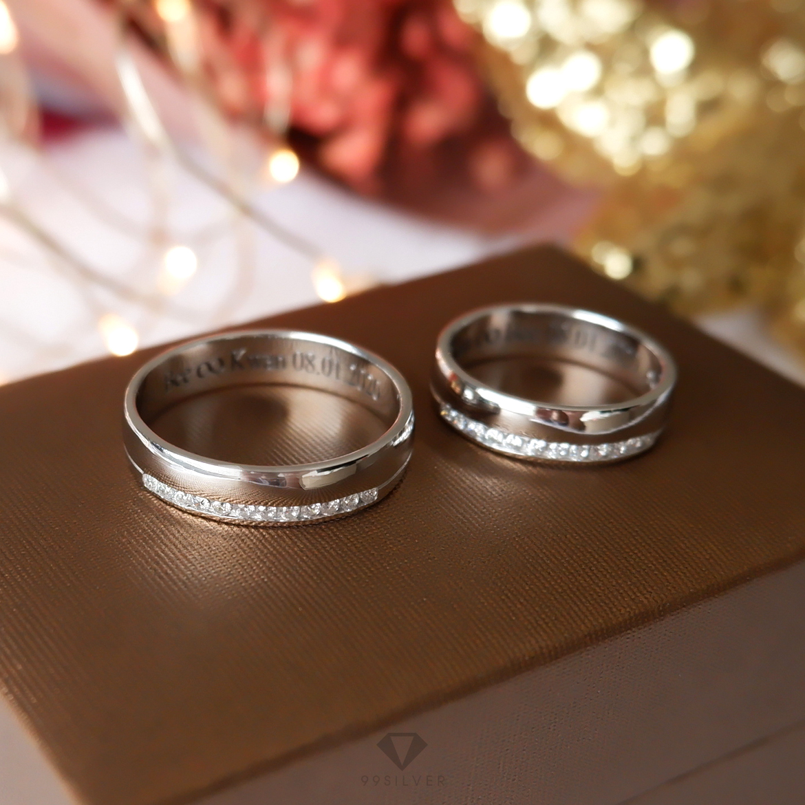 แหวนเงินแท้หน้าโค้งมลเล็กน้อย กว้าง 6 มิลลิมเตร เซาะร่องและฝังเพชร 1 ด้าน