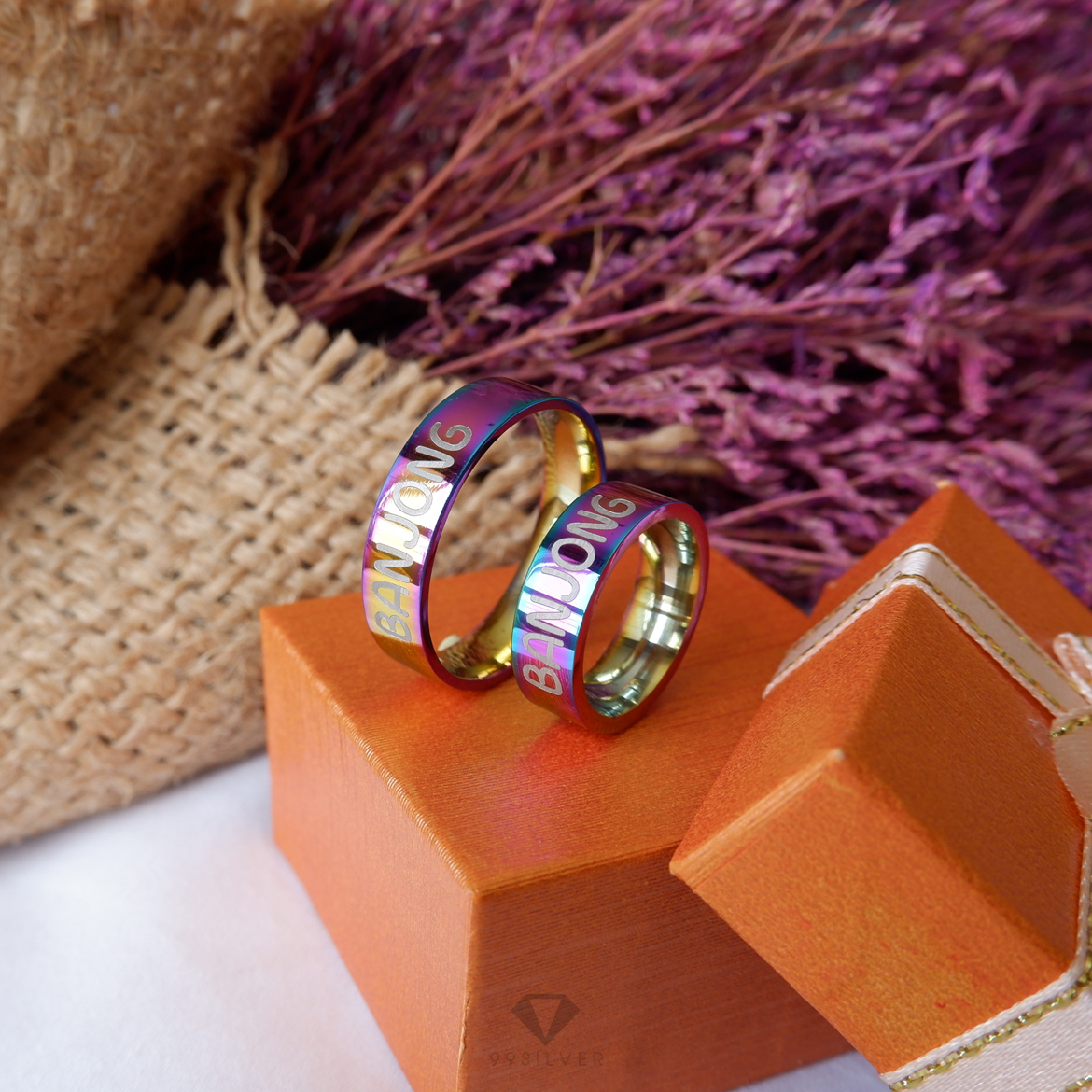 แหวนสแตนเลสไทเทเนี่ยมแท้ หน้ากว้าง 6 มิลลิเเมตร ผิวเงาเรียบ ไดร์ฟสีรุ้งไทเท